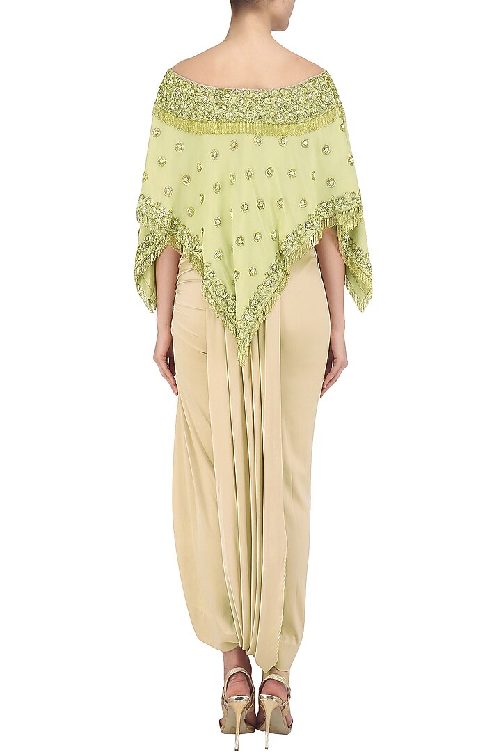 Mellow green off shoulder embroidered top with asymmetrical skirt available only at Pernia's Pop Up Shop.