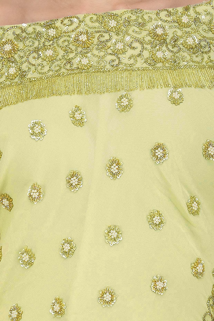 Mellow green off shoulder embroidered top with asymmetrical skirt available only at Pernia's Pop Up Shop.