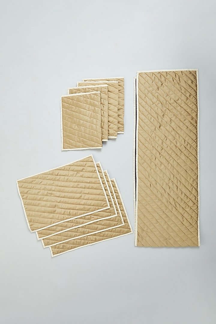 Gold Quilted Table Runner & Place Mats (Set of 9) by NEXUS BY UPASNA at Pernia's Pop Up Shop