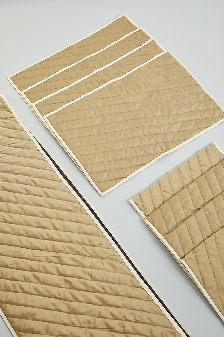 Gold Quilted Table Runner & Place Mats (Set of 9) by NEXUS BY UPASNA at Pernia's Pop Up Shop