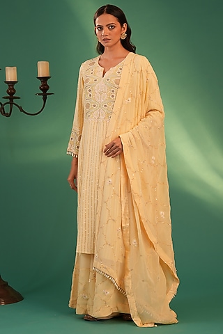 Yellow Pure Georgette Chikankari Embroidered Kurta Set by Nyara by Nicky Chawla