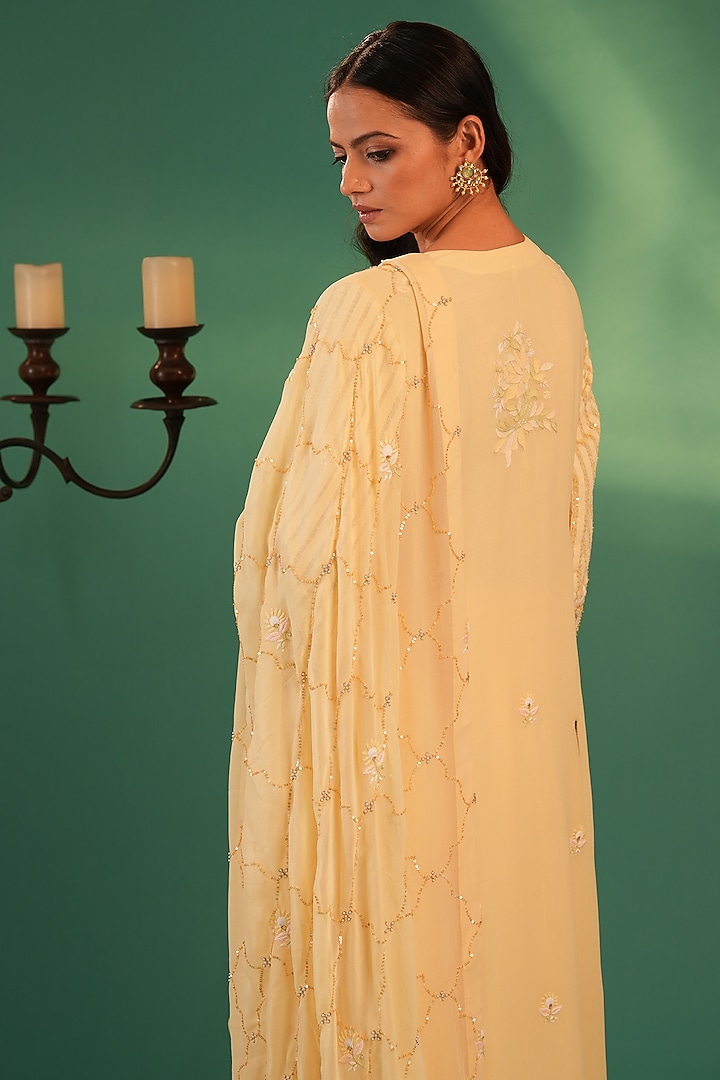 Yellow Pure Georgette Chikankari Embroidered Kurta Set by Nyara by Nicky Chawla at Pernia's Pop Up Shop