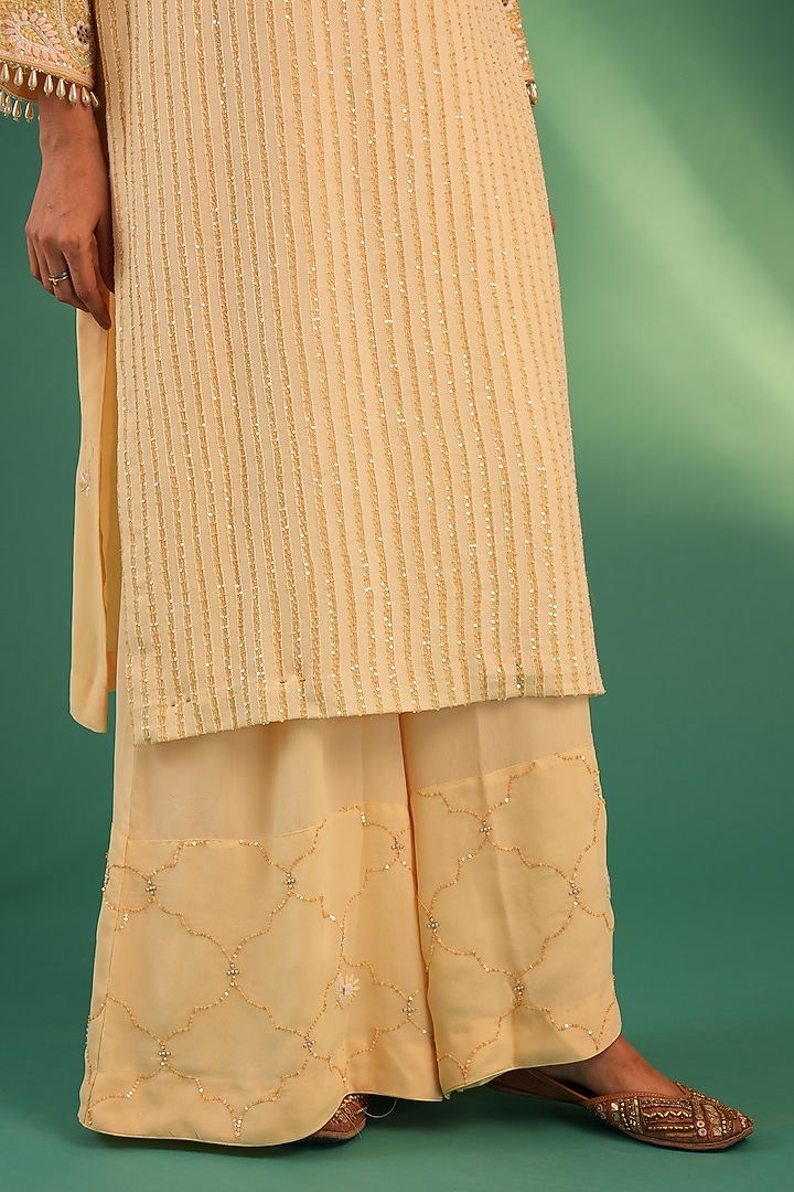 Yellow Pure Georgette Chikankari Embroidered Kurta Set by Nyara by Nicky Chawla at Pernia's Pop Up Shop