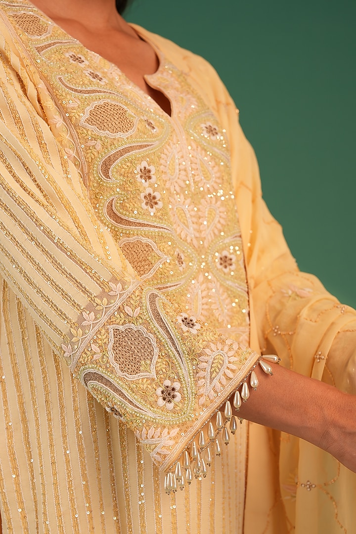 Yellow Pure Georgette Chikankari Embroidered Kurta Set by Nyara by Nicky Chawla at Pernia's Pop Up Shop