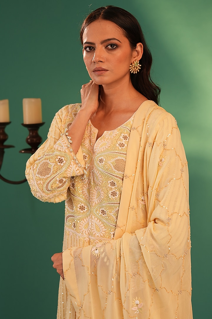 Yellow Pure Georgette Chikankari Embroidered Kurta Set by Nyara by Nicky Chawla at Pernia's Pop Up Shop