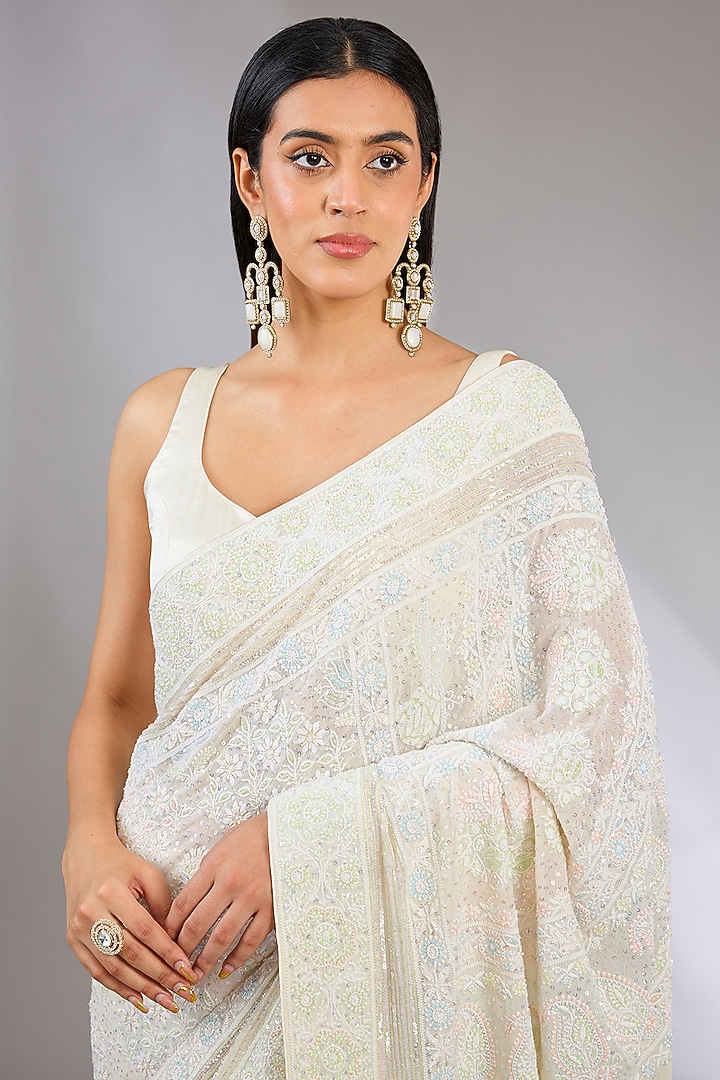 Ivory Pure Georgette Cutdana Embellished Chikankari Reception Saree by Nyara by Nicky Chawla at Pernia's Pop Up Shop