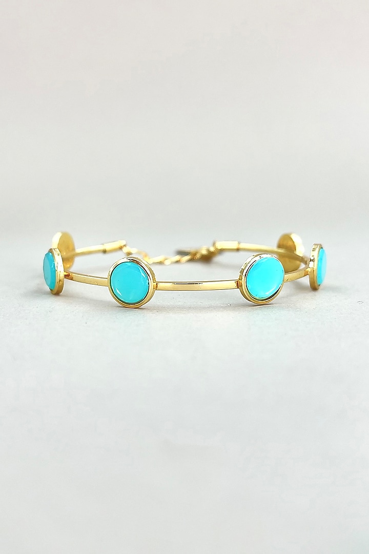 Gold Finish Blue Stone Adjustable Bangle by Nyela at Pernia's Pop Up Shop