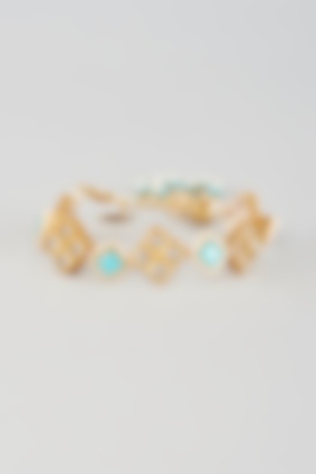 Gold Finish Kundan Polki & Blue Stone Cuff by Nyela at Pernia's Pop Up Shop