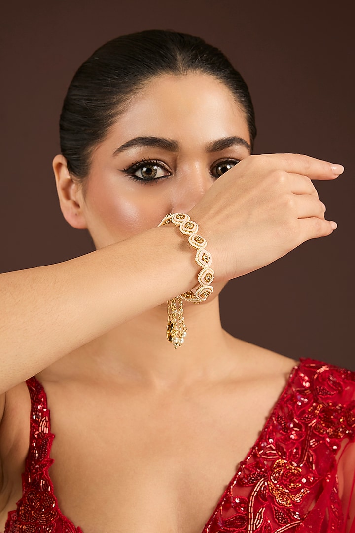 Gold Finish Stone Bracelet by Nyela at Pernia's Pop Up Shop