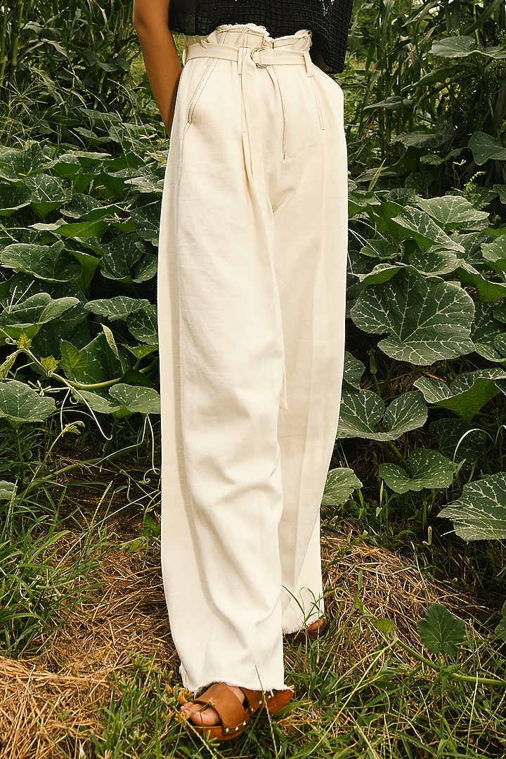 White Pleated Wide-Legged Trousers by Ode To Odd at Pernia's Pop Up Shop