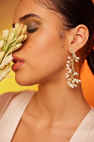 Gold Finish Pearl Dangler Earrings In Sterling Silver by ODE