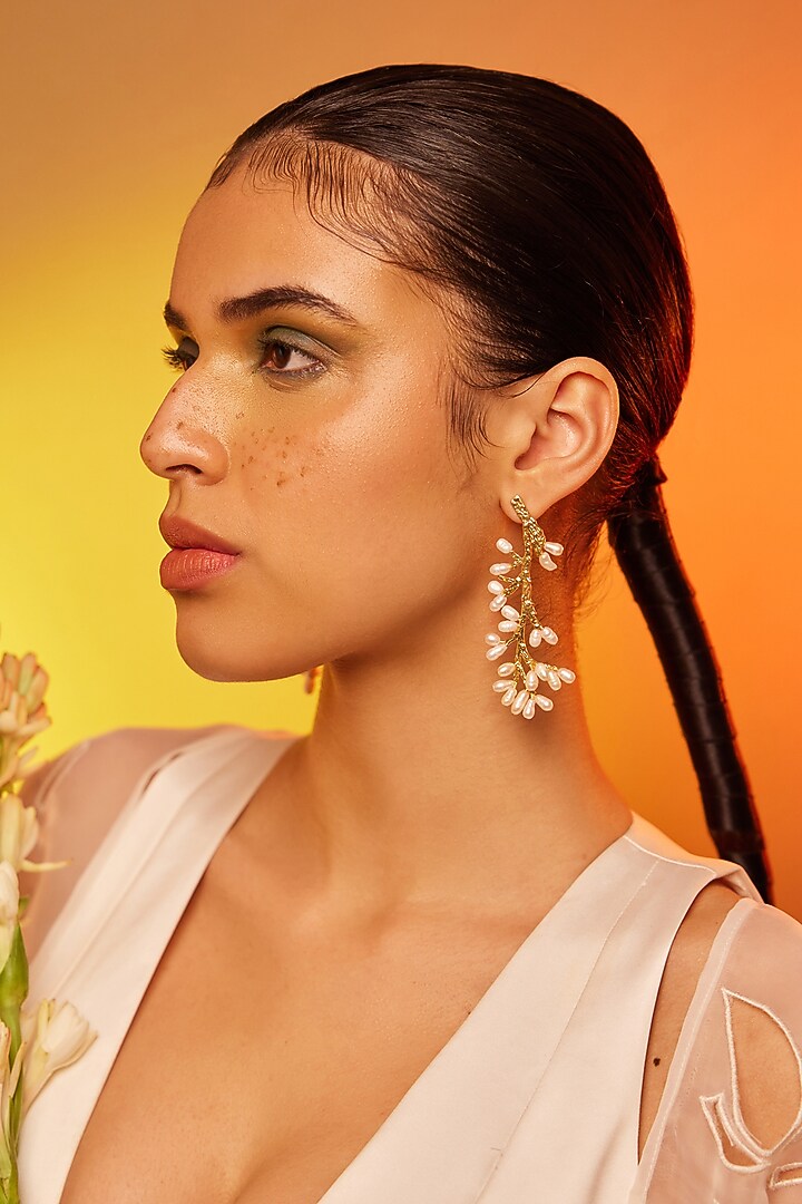 Gold Finish Pearl Dangler Earrings In Sterling Silver by ODE at Pernia's Pop Up Shop
