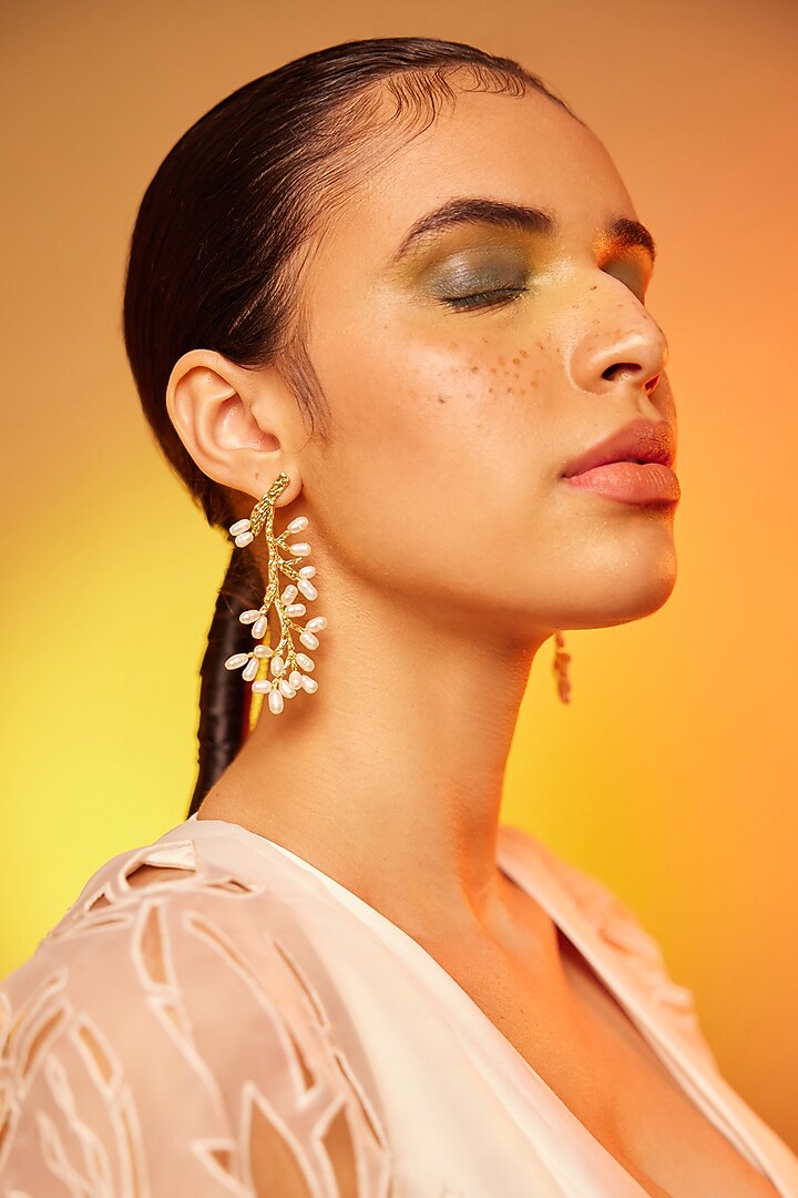 Gold Finish Pearl Dangler Earrings In Sterling Silver by ODE at Pernia's Pop Up Shop