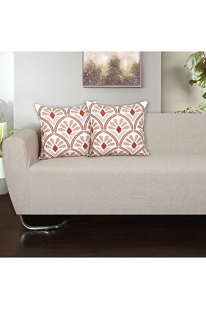 Rust & White Aari Embroidered Cotton Cushion Cover Set by Ode And Cleo at Pernia's Pop Up Shop