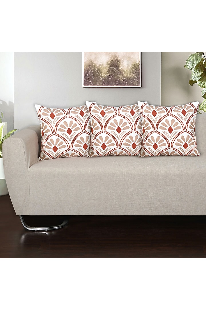 Rust & White Aari Embroidered Cotton Cushion Cover Set by Ode And Cleo at Pernia's Pop Up Shop