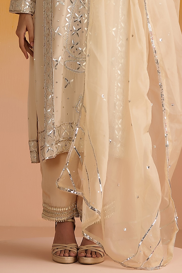 Beige Crepe Hand Embroidered Kurta Set by OHH CROW INDIA at Pernia's Pop Up Shop