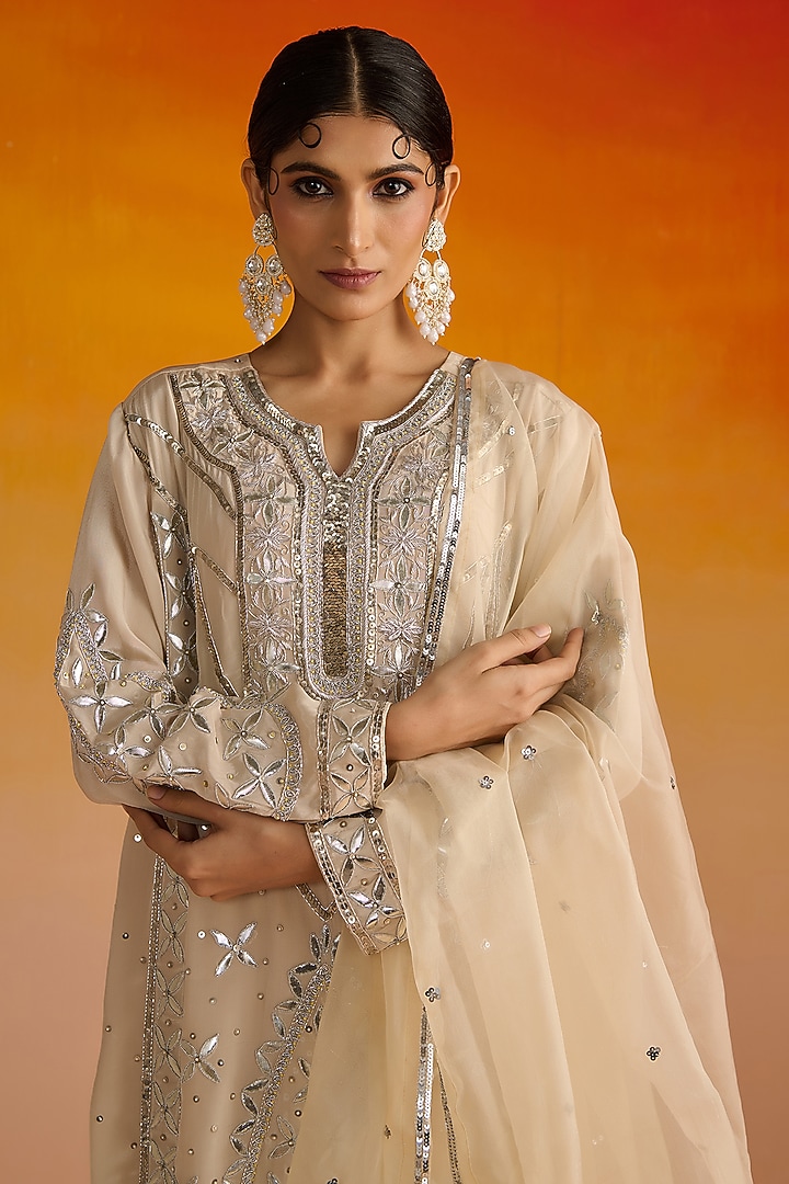 Beige Crepe Hand Embroidered Kurta Set by OHH CROW INDIA at Pernia's Pop Up Shop