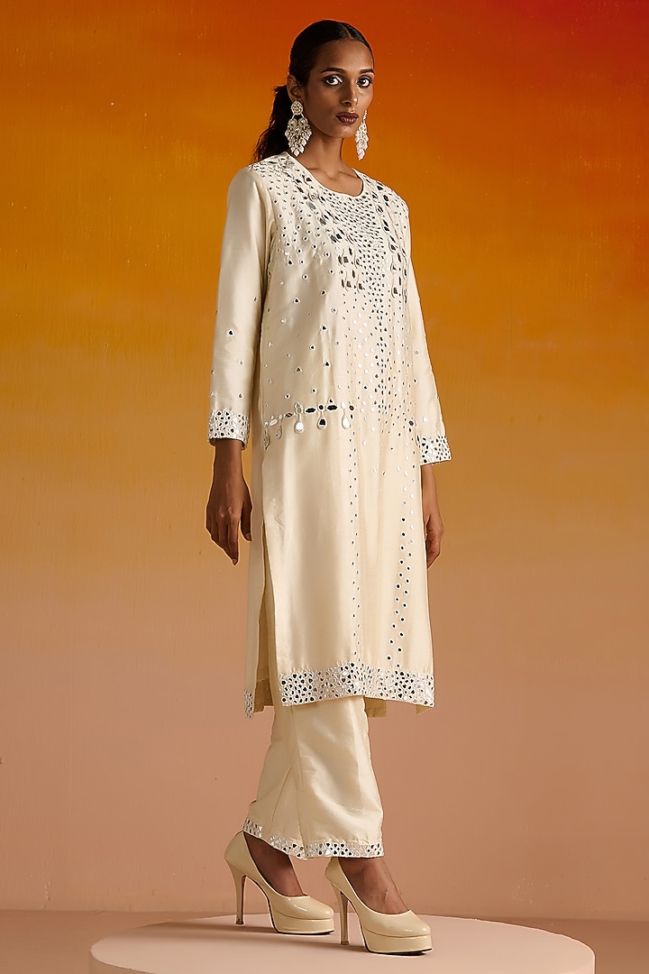 Ivory Raw Silk Mirror Hand Embroidered Kurta Set by OHH CROW INDIA at Pernia's Pop Up Shop