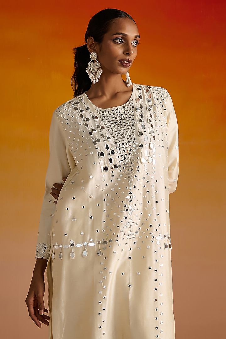 Ivory Raw Silk Mirror Hand Embroidered Kurta Set by OHH CROW INDIA at Pernia's Pop Up Shop
