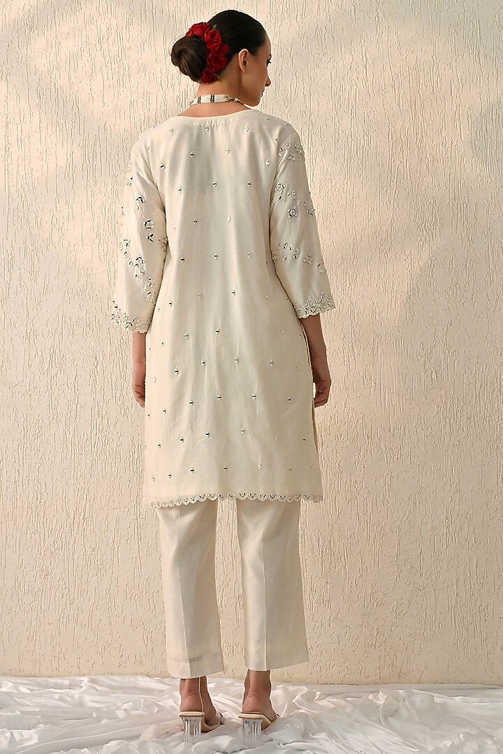 Powder Cream Chanderi Silk Mirror Hand Embroidered Kurta Set by OHH CROW INDIA at Pernia's Pop Up Shop
