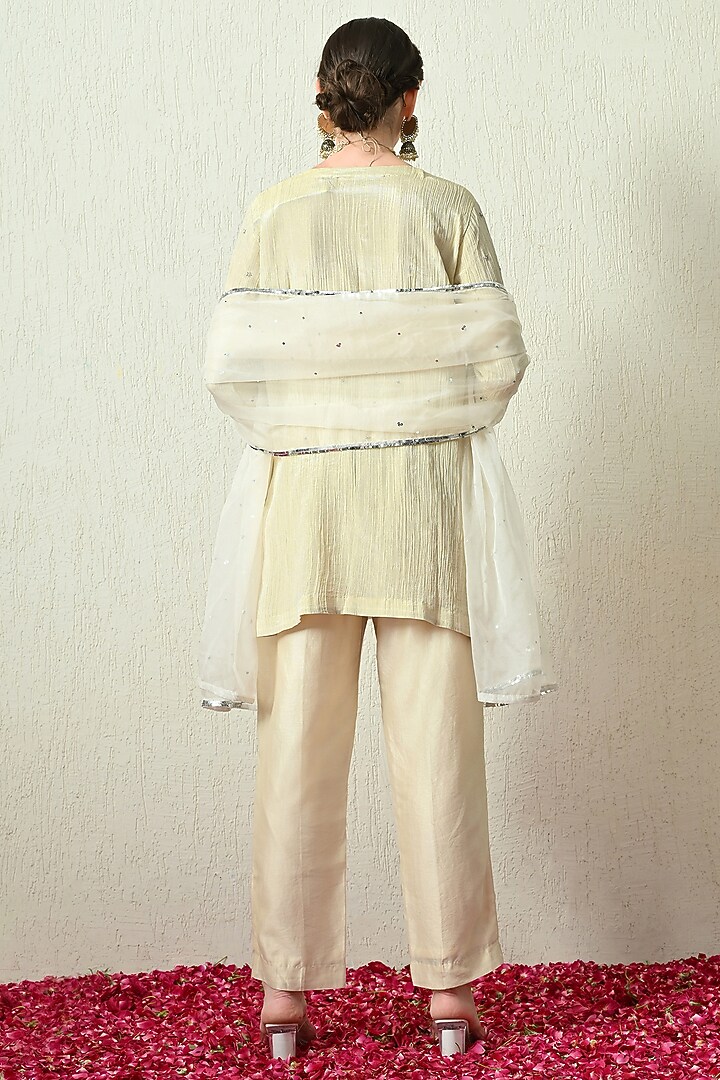 Ivory Crushed Tissue Silk Hand Embroidered Short Kurta Set by OHH CROW INDIA at Pernia's Pop Up Shop