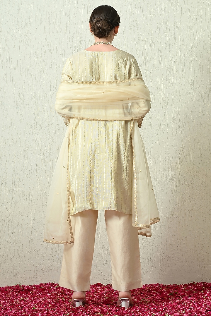 Ivory Crushed Tissue Silk Hand Embroidered Kurta Set by OHH CROW INDIA at Pernia's Pop Up Shop