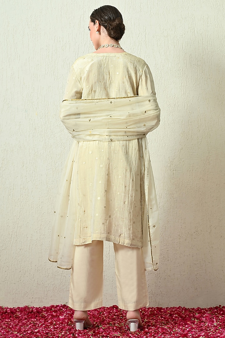Ivory Crushed Tissue Silk Hand Embroidered Kurta Set by OHH CROW INDIA at Pernia's Pop Up Shop