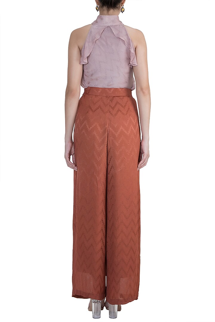 Rust Chevron Flared Pants by Ohaila Khan at Pernia's Pop Up Shop