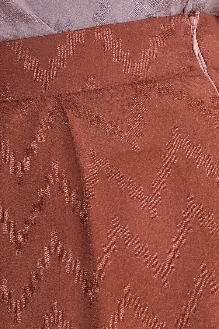 Rust Chevron Flared Pants by Ohaila Khan at Pernia's Pop Up Shop