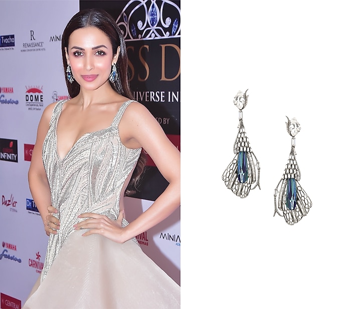 Gunmetal plated pinion wing shaped earrings available only at Pernia's Pop Up Shop.