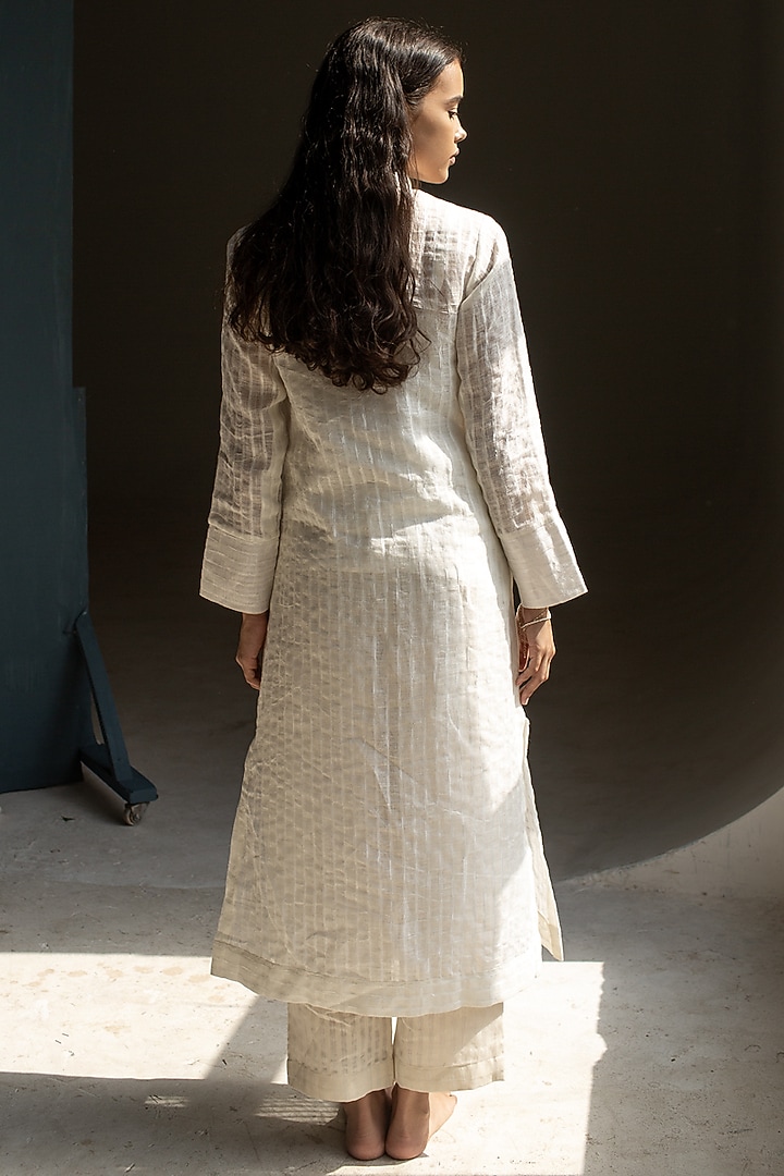 Ivory Linen Fletcher Hand Embroidered Kurta Set by OJA at Pernia's Pop Up Shop