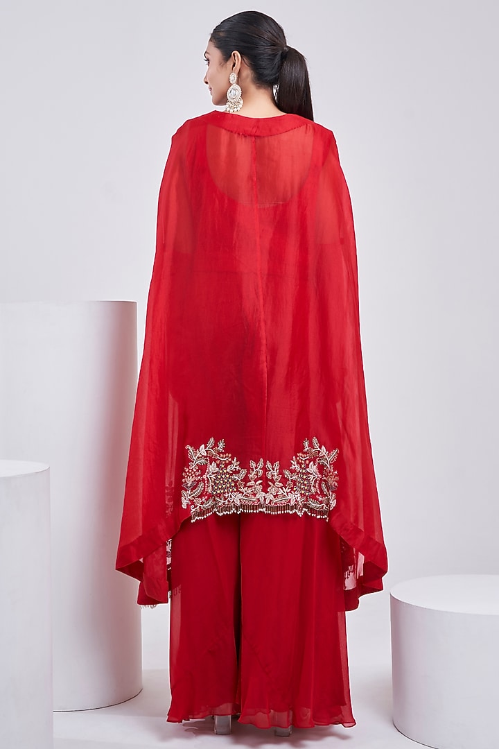 Red Organza Hand Embroidered Asymmetrical Cape Set by Ojasvini at Pernia's Pop Up Shop