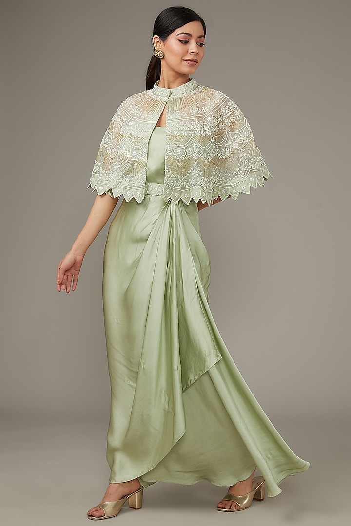 Green Satin Gown With Embroidered Cape by Ojasvini