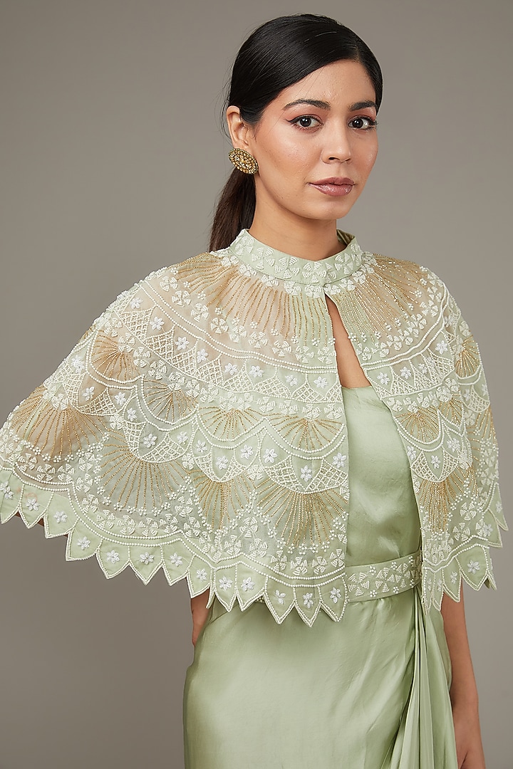 Green Satin Engagement Gown With Embroidered Cape by Ojasvini at Pernia's Pop Up Shop