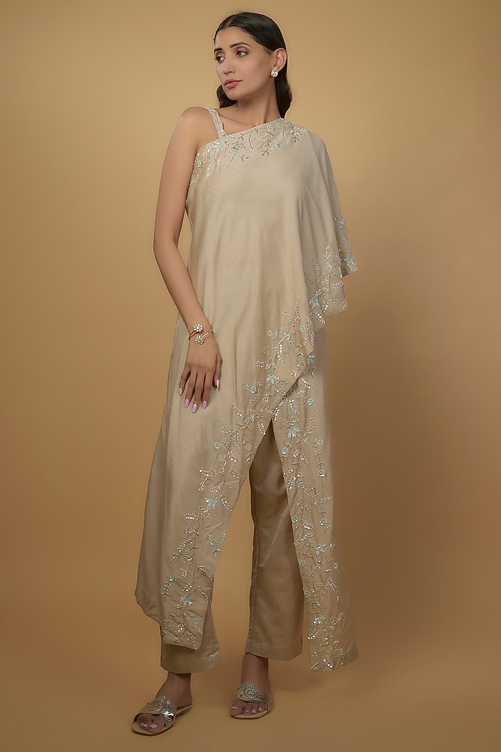 Beige Silk & Mushroom Satin Embroidered One-Shoulder Cape Set by Ojasvini at Pernia's Pop Up Shop
