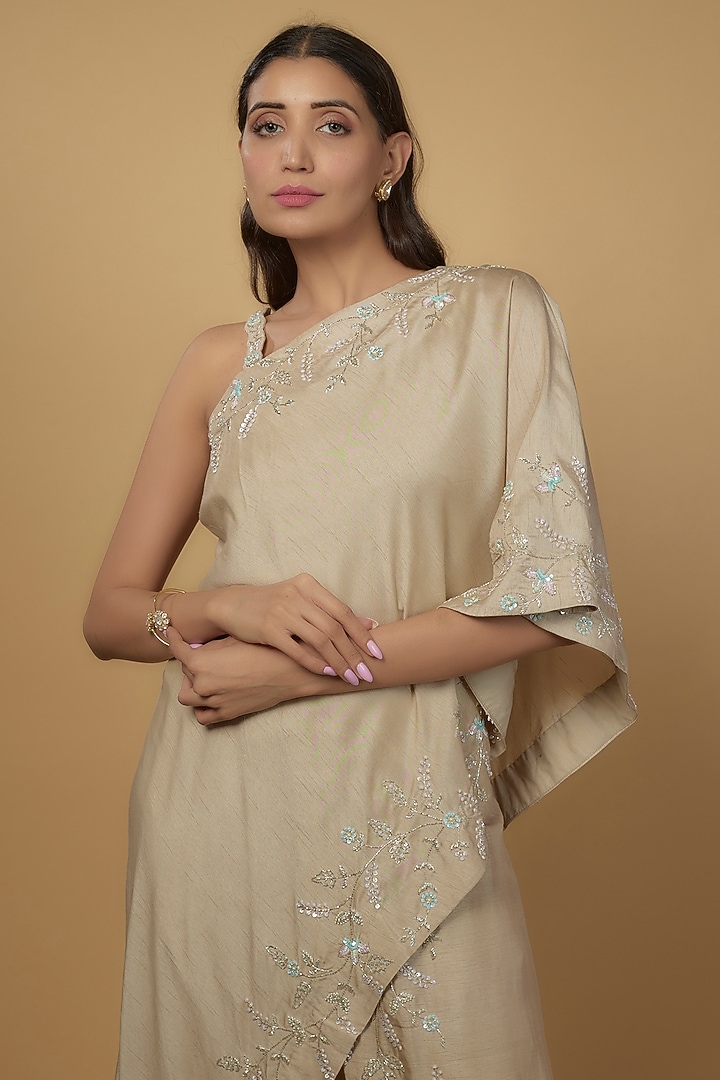 Beige Silk & Mushroom Satin Embroidered One-Shoulder Cape Set by Ojasvini at Pernia's Pop Up Shop
