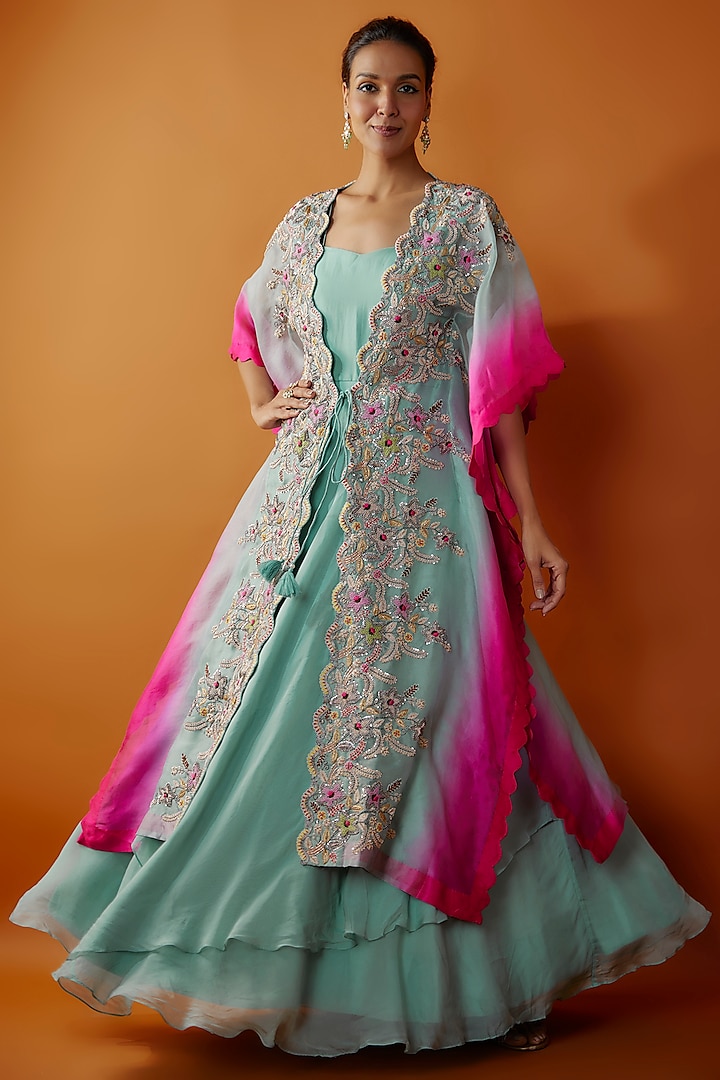 Aqua & Rani Pink Satin Organza Gown With Cape by Ojasvini