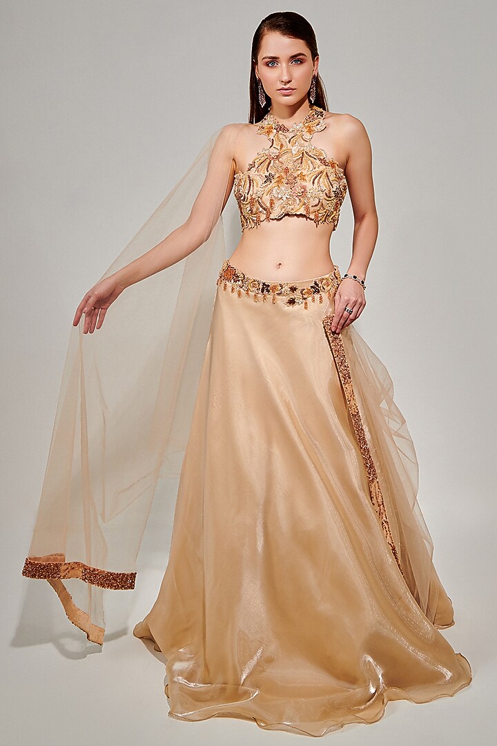 Beige Metallic Fluid Organza Embellished Wedding Lehenga Set by One Knot One By Ashna at Pernia's Pop Up Shop