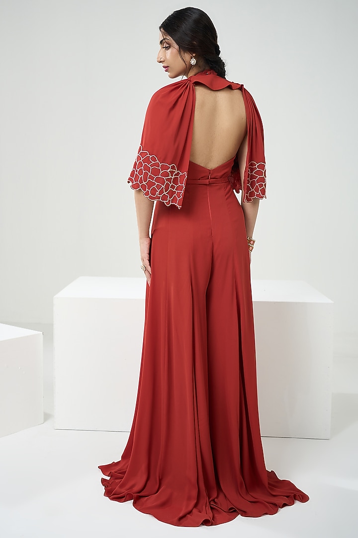 Rust Orange Georgette Cutdana Embroidered Jumpsuit With Cape by One Knot One By Ashna at Pernia's Pop Up Shop