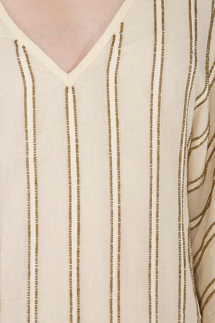 Ivory Hand Beaded Kaftan Dress by Ollari at Pernia's Pop Up Shop