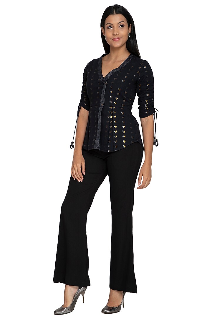 Black Fit & Flare Pants by Our Love at Pernia's Pop Up Shop