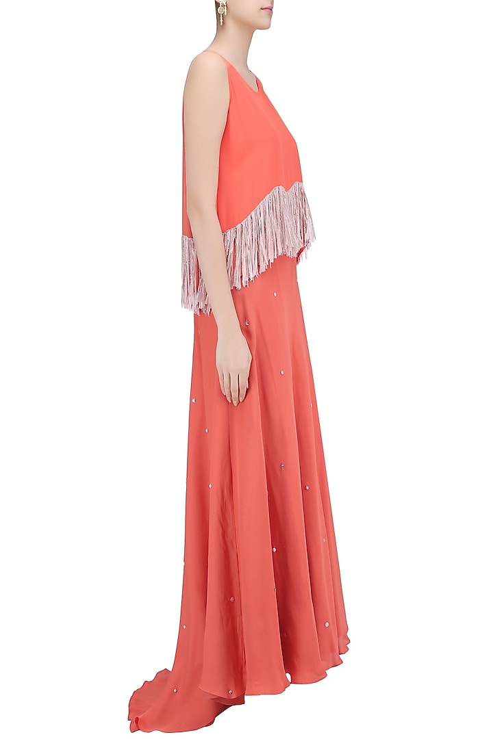 Coral fringe tassel top and sequinned lehenga skirt set available only at Pernia's Pop Up Shop.
