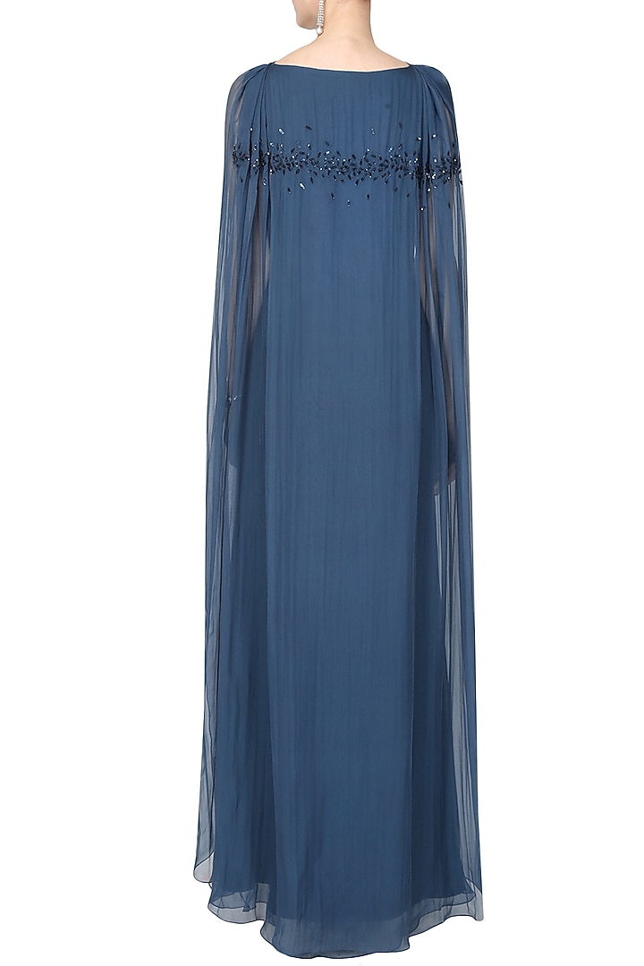 Ohaila Khan presents Cobalt blue leaf thread and sequins embroidered draped cape gown available only at Pernia's Pop Up Shop.