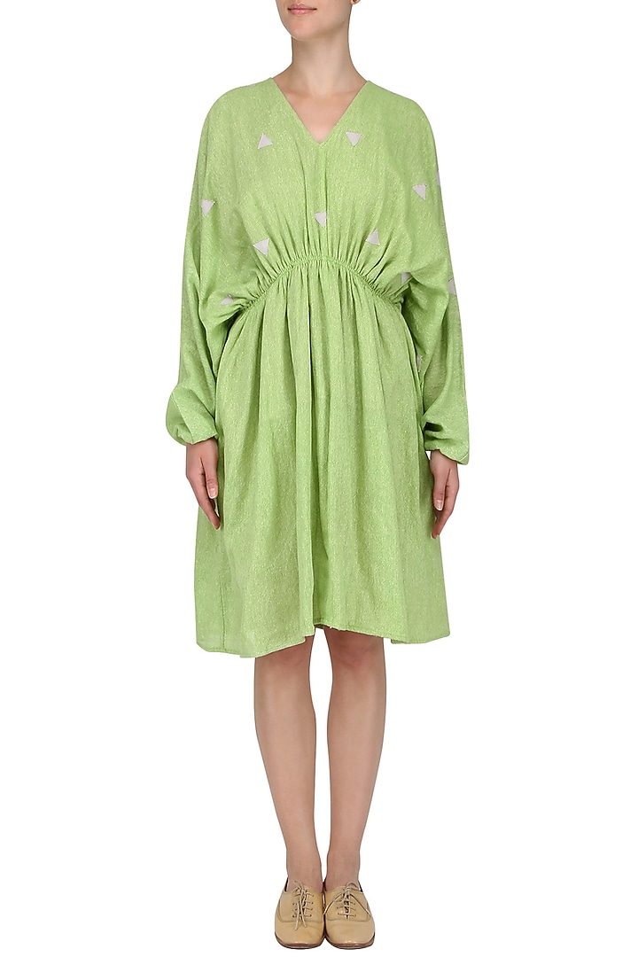 Green pleated kaftan dress available only at Pernia's Pop Up Shop.