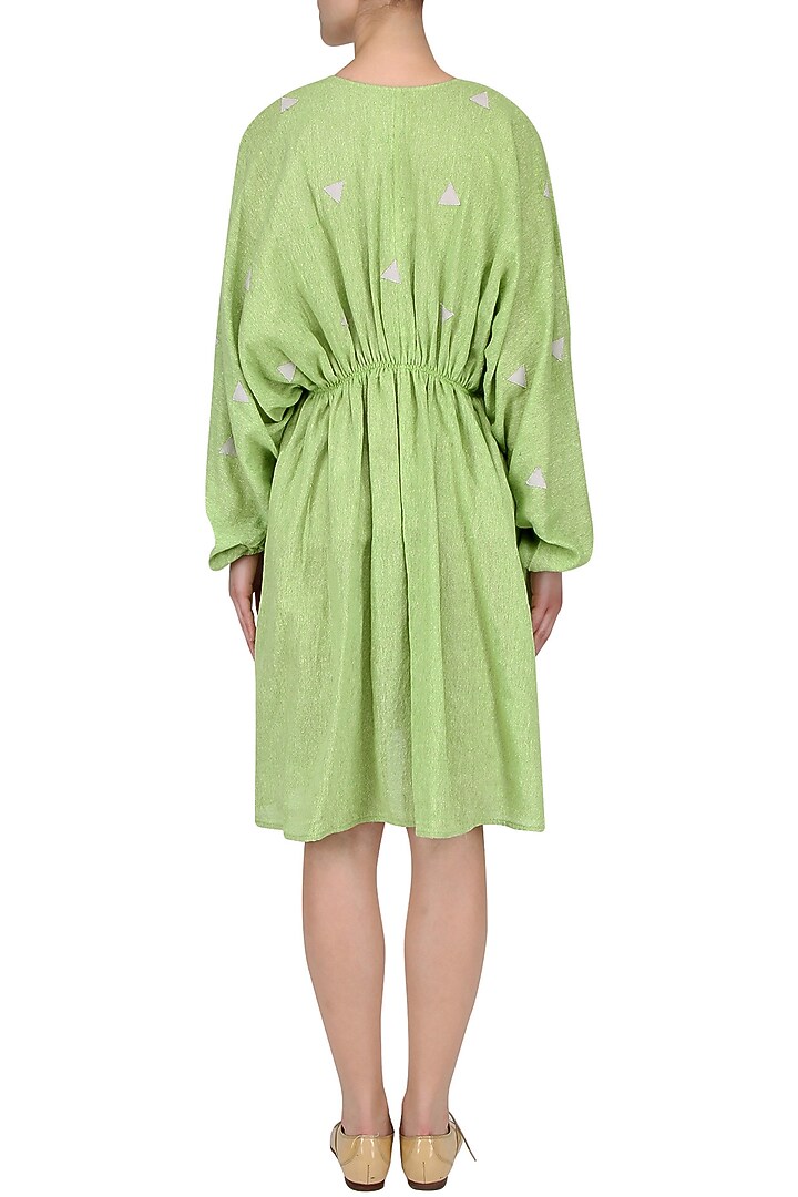 Green pleated kaftan dress available only at Pernia's Pop Up Shop.