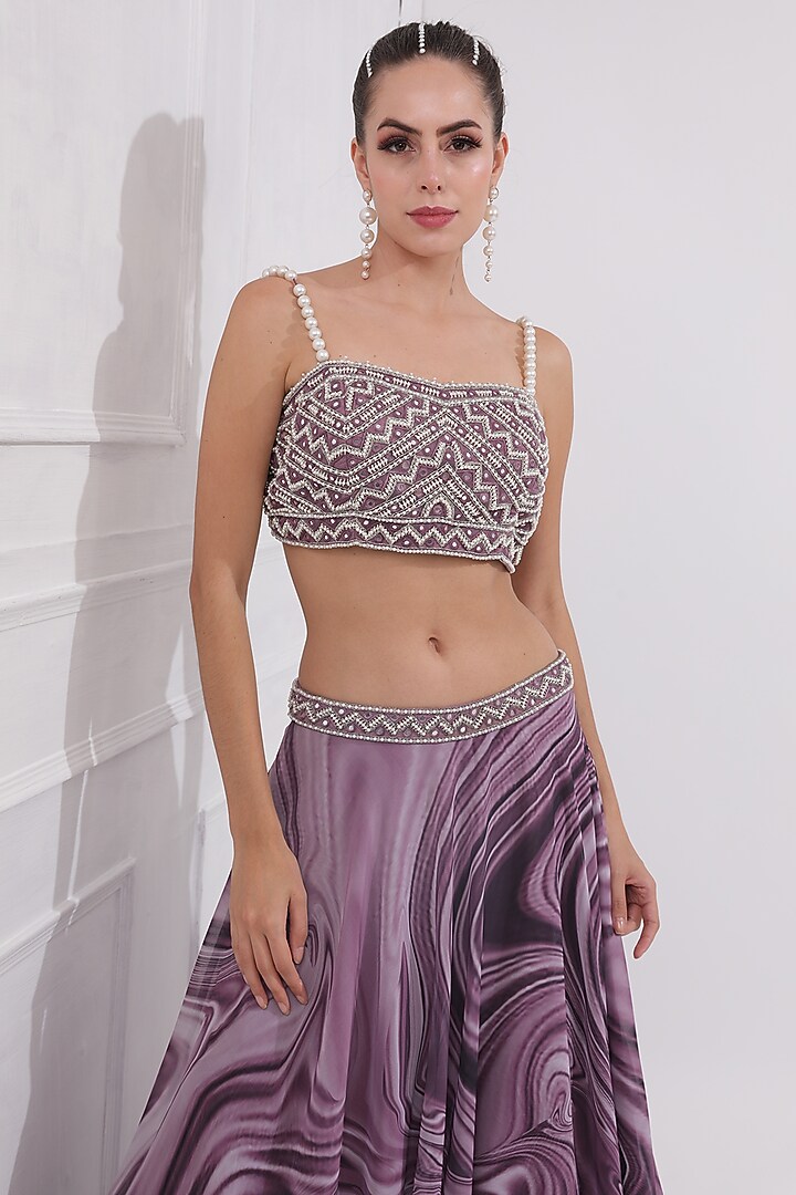 Dusky Lilac Georgette Wave Printed & Pearl Embellished Layered Wedding Lehenga Set by OMAL SINDWANI at Pernia's Pop Up Shop