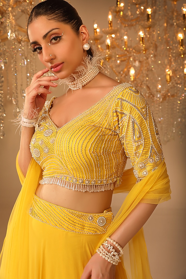 Yellow Georgette & Net Pearl Embroidered Wedding Lehenga Set by OMAL SINDWANI at Pernia's Pop Up Shop