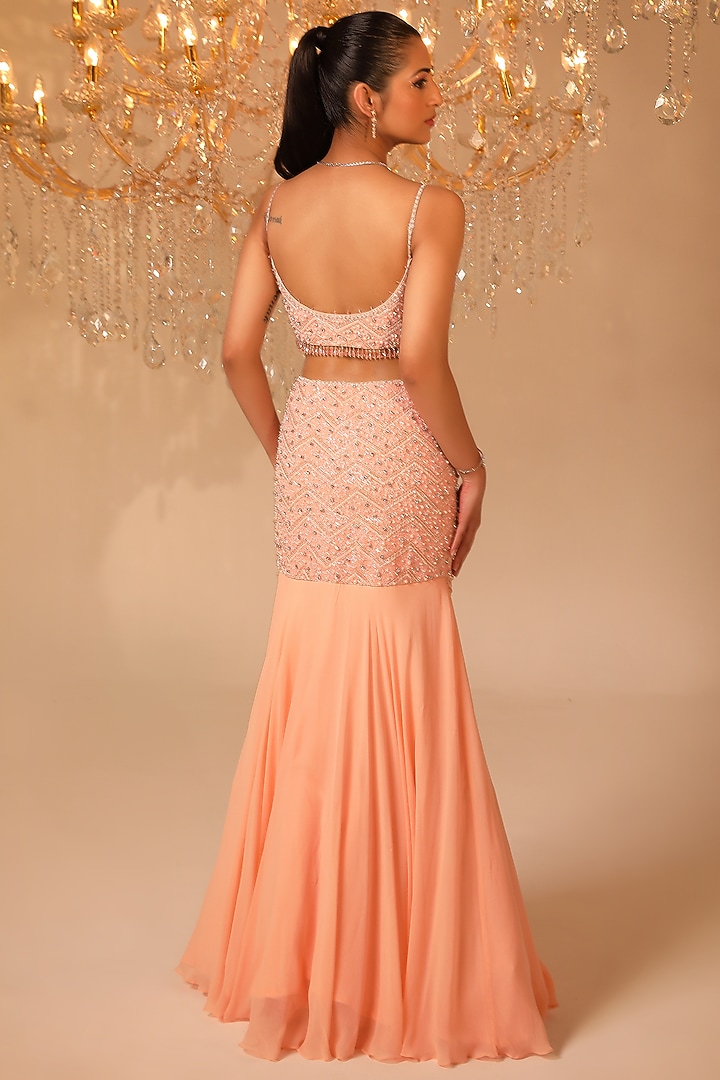 Peach Net & Georgette Embroidered Cape Wedding Lehenga Set by OMAL SINDWANI at Pernia's Pop Up Shop
