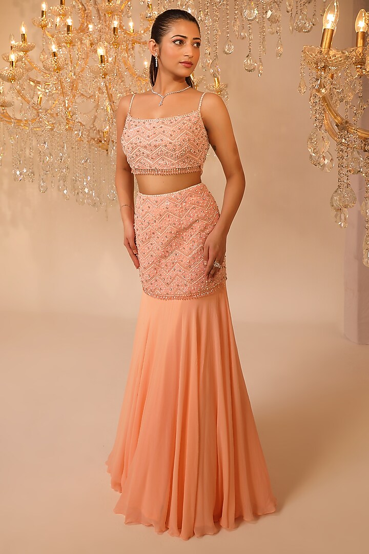 Peach Net & Georgette Embroidered Cape Wedding Lehenga Set by OMAL SINDWANI at Pernia's Pop Up Shop