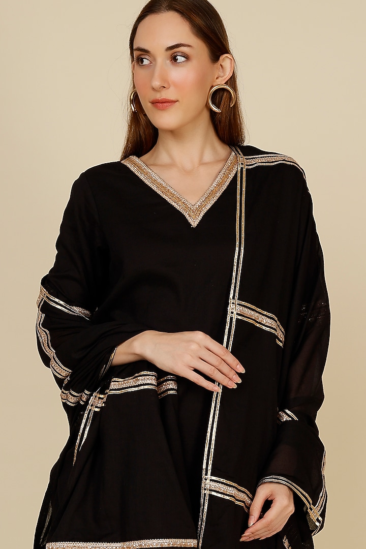 Black Mulmul Sharara Set by Omaana Jaipure at Pernia's Pop Up Shop